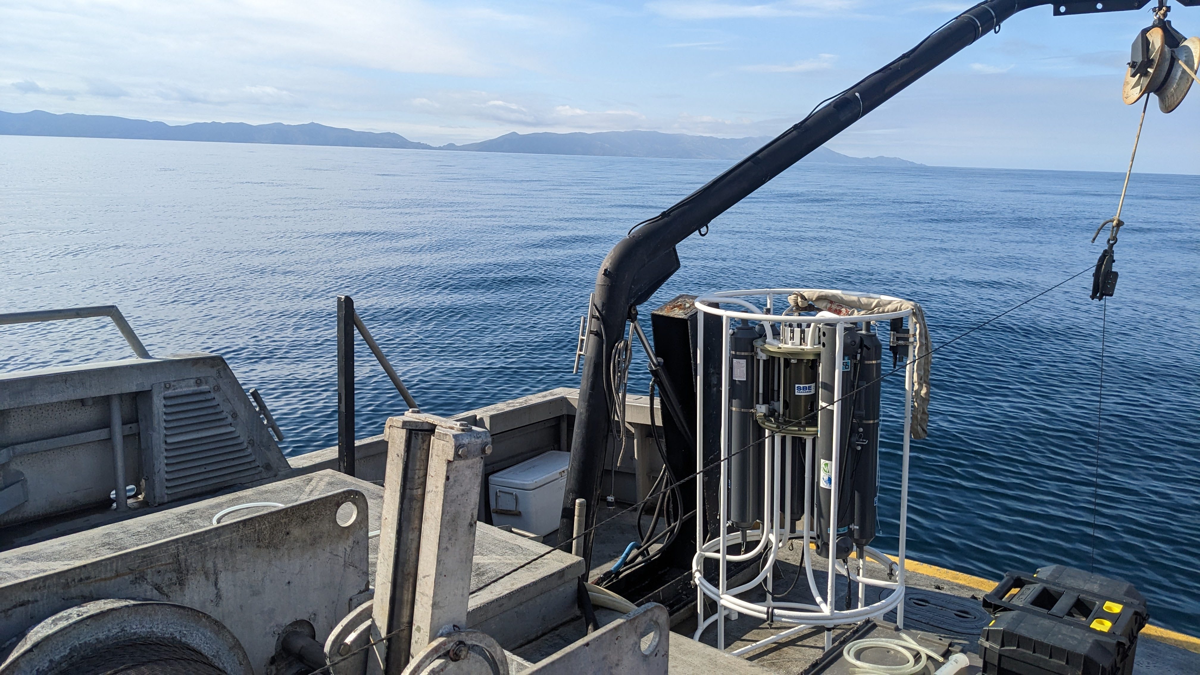 Oceanographic equipment and open ocean viewed from a research vessel